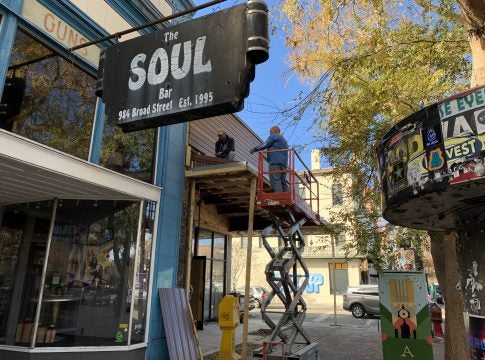Two construction workers labored Christmas Week to help the owner open his dual concept restaurant next to The Soul Bar in the former Blue Sky Kitchen.