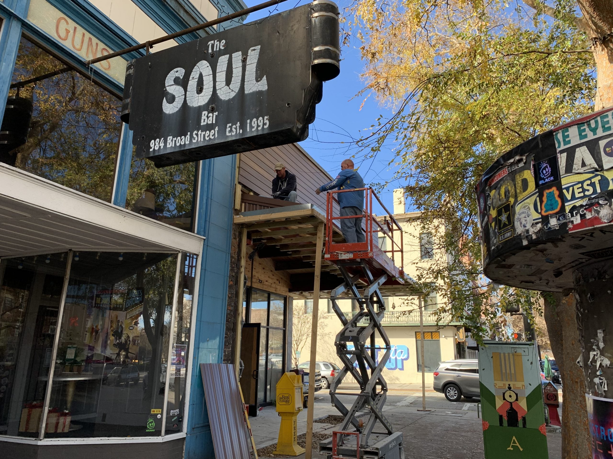 Two construction workers labored Christmas Week to help the owner open his dual concept restaurant next to The Soul Bar in the former Blue Sky Kitchen.
