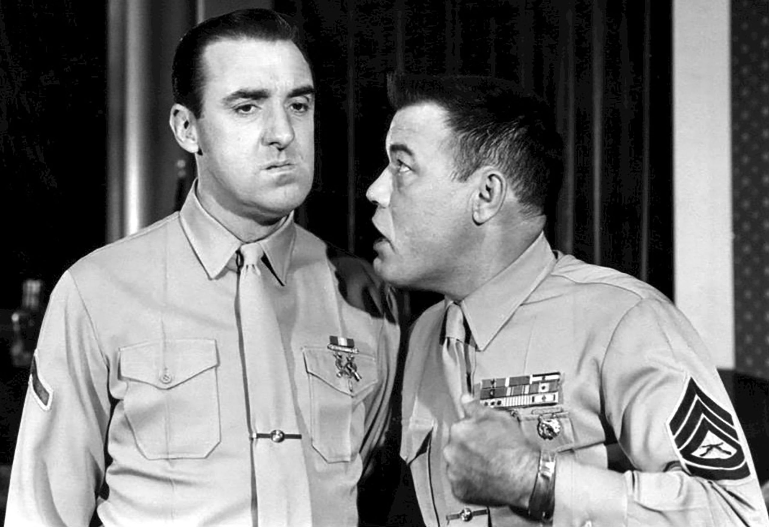 Photo cutline: Jim Nabors, left, and his “Gomer Pyle” co-star Frank Sutton, in a scene from the television program. Photo from CBS Television, Public domain, via Wikimedia Commons.