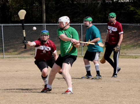 Will Renfro (maroon jersey) tries to block Galway native Brendan Geraghty's scoring attempt. Photo courtesy Erika Knight.
