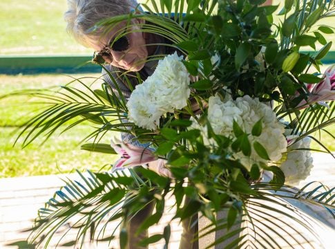 Vera creating flower arrangement