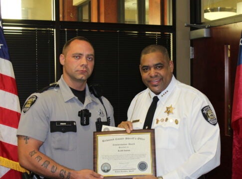 Deputy Keith Inman, left, was commended by Richmond County Sheriff Richard Roundtree in 2017 after Inman and another officer gave CPR and revived an unresponsive man. Friday, a Richmond County jury found a man who seriously injured Inman, Kaylon Smith, not guilty of aggravated assault.