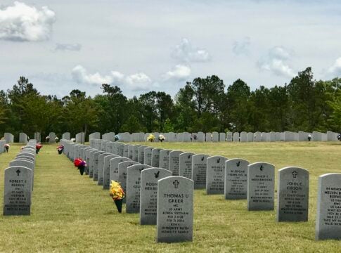 Lines of identical headstones mark the graves of veterans at the Georgia Veterans Memorial Cemetery in Milledgeville.