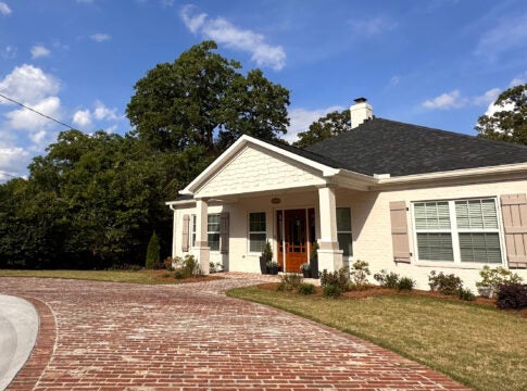 An Augusta short-term rental sits on a tree-lined city street. The house has ample off-street parking and lists for $2,842 weekly on an online booking platform. Augusta commissioners are looking at potentially drafting an ordinance to regulate short-term rentals after some have caused problems. Staff photo by Susan McCord