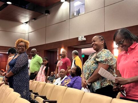 Members of former Mayor Edward McIntyre's family and church appeared in support of naming Augusta's Riverwalk for him Thursday. The Augusta Commission unanimously approved doing so. Staff photo by Susan McCord