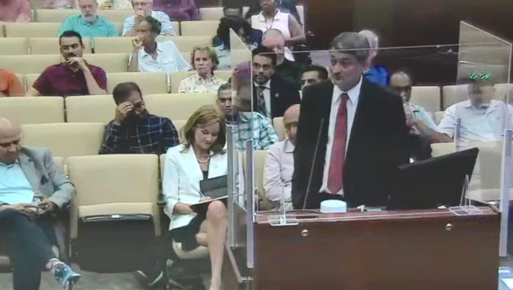 Andy Sharma, whose parents run an Augusta hotel, speaks to the Augusta Commission Tuesday about issues with crime and law enforcement. Staff photo by Susan McCord