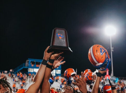 Midland Valley's football team hoists a region championship trophy after defeating North Augusta for the Region 4-AAAA title on Friday Oct. 27, 2023. The Mustangs will host Easley Friday at 7:30 p.m. in the SCHSL Class AAAA first round playoff game. Staff photo by Joey Tracey.