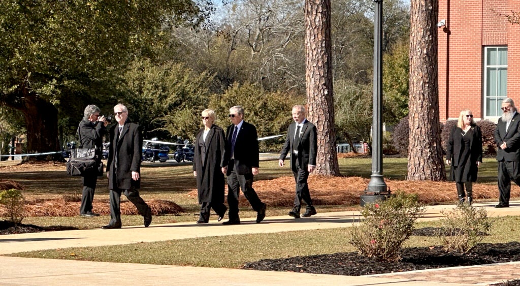 From left, Jack Carter, James Earl "Chip" Carter and wife Becky Payne, Jeff Carter and Amy Carter with husband James Gregory Wentzel appear at a Nov. 27, 2023 ceremony honoring their mother, former First Lady Rosalynn Carter at Georgia Southwestern State University. Staff photo by Susan McCord