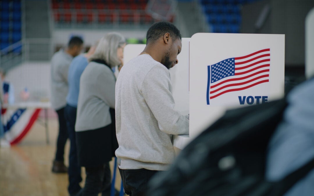Man voting in election