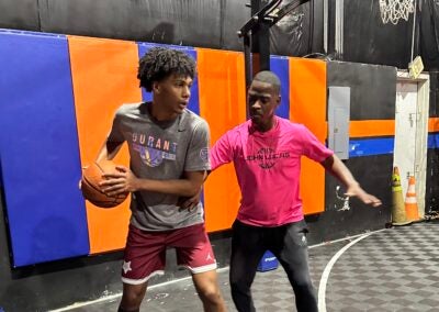 Augusta basketball trainer Darrin Shine, right, works with Washington D.C. top-100 point guard prospect Acaden Lewis during Peach Jam week. Shine has been opening his facility to Peach Jam players from across the country since 2018, and hopes to do more in the future. | Staff photo by Gabriel Stovall.