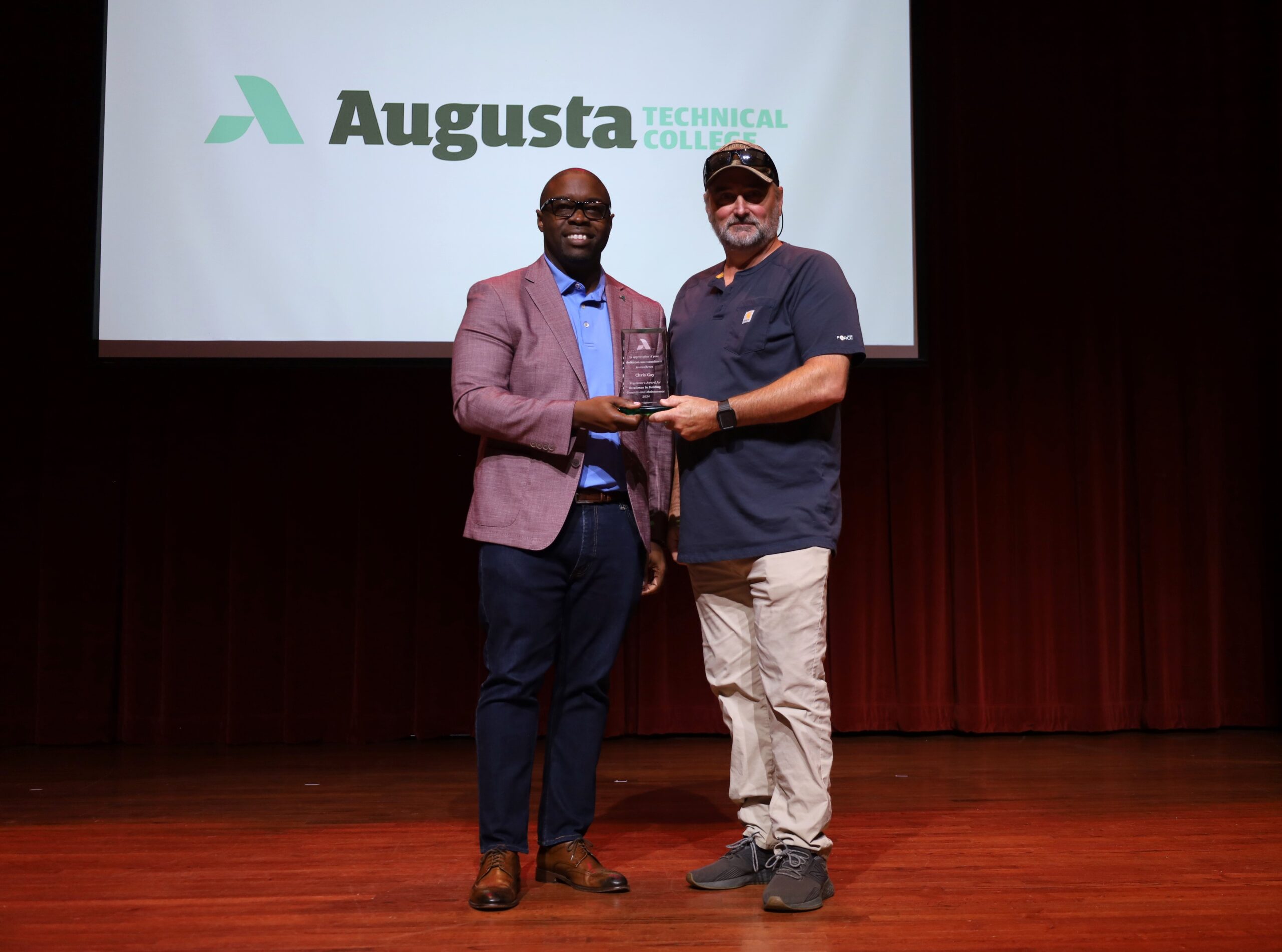 Chris Gay receiving Augusta Tech award