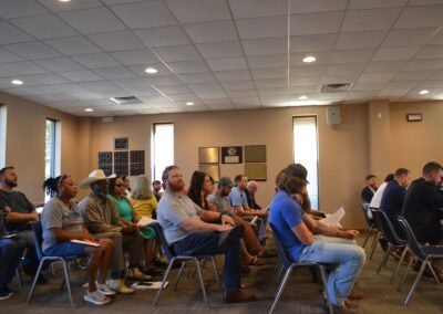 Residents of Rockford Drive and the surrounding area attend the Columbia County Board of Commissioners meeting on Tuesday, Aug. 20 to speak out against the of 5821 Rockford Drive from R-A (Residential Agricultural) to S-1 (Special). Staff photo by Stephanie Hill