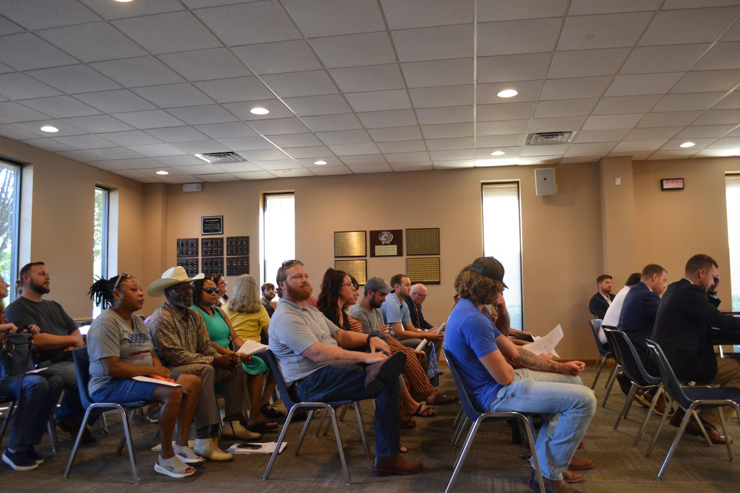 Residents of Rockford Drive and the surrounding area attend the Columbia County Board of Commissioners meeting on Tuesday, Aug. 20 to speak out against the of 5821 Rockford Drive from R-A (Residential Agricultural) to S-1 (Special). Staff photo by Stephanie Hill