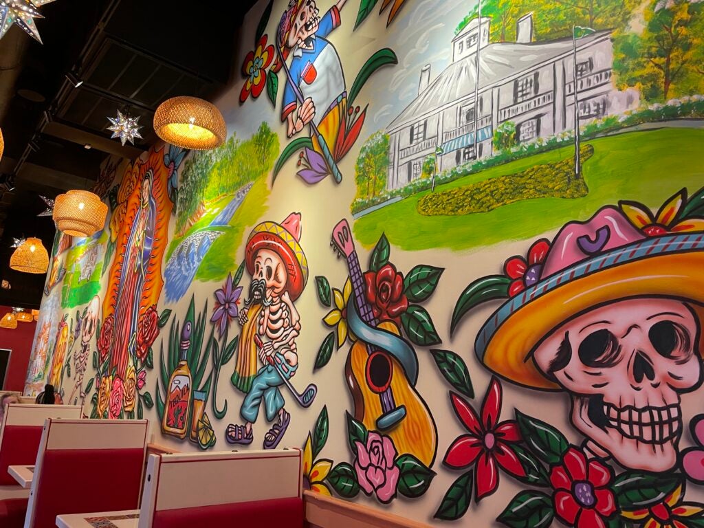 The walls at El Paso Tacos & Tequila shout with colorful images of Augusta landmarks. Photo by Danielle Wong Moores