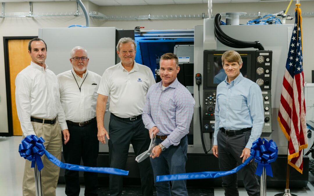 Jason Burkhardt, NNSA Director for SRS Plutonium Modernization, cuts the ribbon to officially open the Machining Training Center at SRS. Also pictured from left to right: Patrick Schneider, Pit Production Operations – Area Operations Director; Rick Nash, MTC Operations; Dennis Carr, SRNS President and CEO; and Dr. Marvin Adams, NNSA Deputy Administrator for Defense Programs.