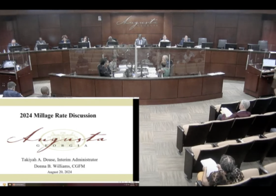 Augusta commissioners agreed Tuesday to advertise millage rates that would mean a slightly lower tax bill for property owners whose assessments did not increase this year.