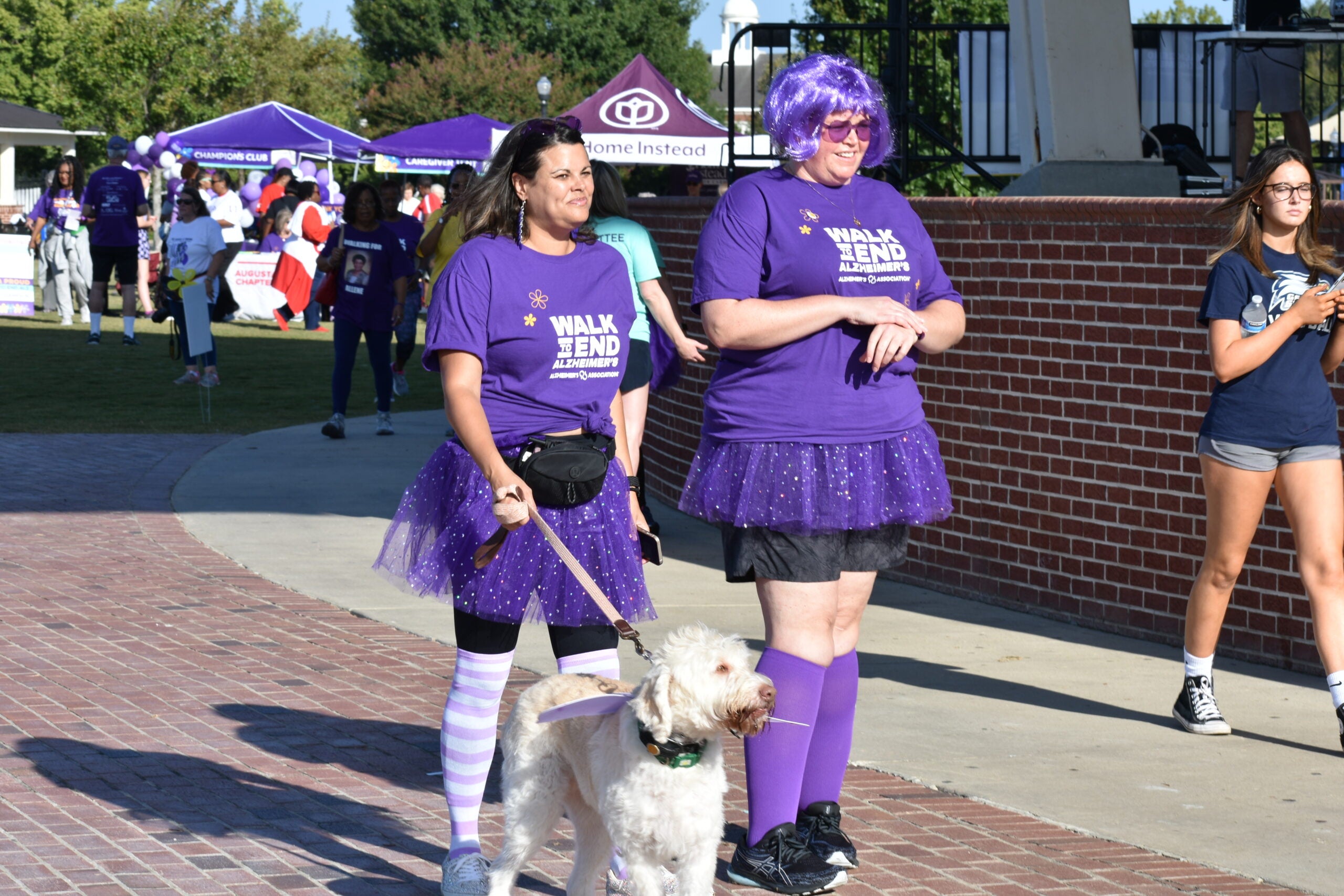 Attendees at the Walk to End Alzheimer's wear purple during a previous walk. Photo courtesy Alzheimer's Association