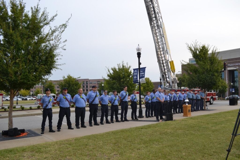 Photo of public safety officers standing at attention