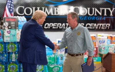 Brian Kemp and Donald Trump shake hands