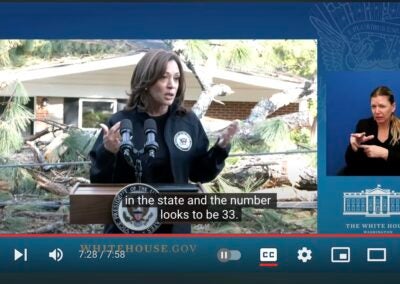 Vice President Kamala Harris speaks on video in front of an Augusta house destroyed by Hurricane Helene. Screen capture courtesy White House