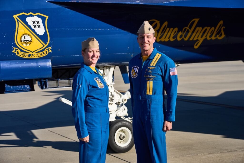Major Scott Laux and Lt. Commander Lilly Montana, with the Blue Angels pose with their plane at the Augusta Regional Airport on Thursday, Nov. 21. Staff photo by Sanjeev Singhal