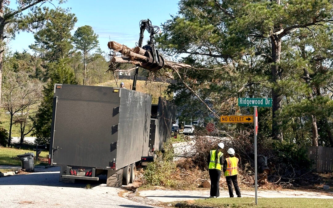 A debris truck removes trees from Sandy Ridge Place Nov. 13, 2024. Sept. 27 was the one-year anniversary of Hurricane Helene's strike on Augusta. Staff photo by Susan McCord