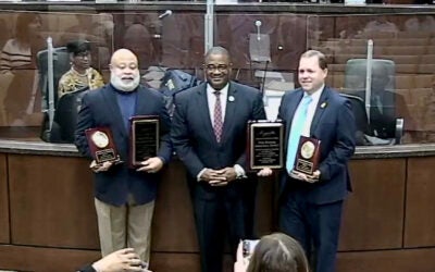 A good bye: The Augusta Commission said farewell Tuesday to members Bobby Williams, left, and Sean Frantom, right. Both leave office this year. Between them is Augusta Mayor Garnett Johnson.