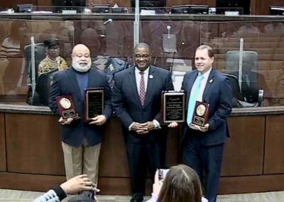 A good bye: The Augusta Commission said farewell Tuesday to members Bobby Williams, left, and Sean Frantom, right. Both leave office this year. Between them is Augusta Mayor Garnett Johnson.