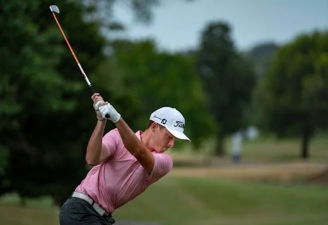 The Cayman Island's Justin Hastings (above) earned a share of the lead after a seven-under 65 on Friday. Photograph by LAAC.