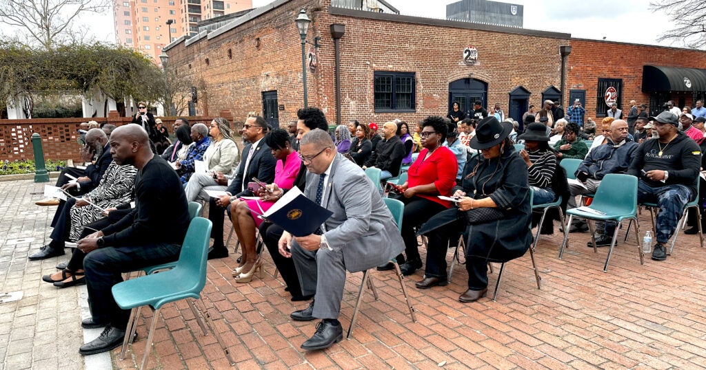 Augusta officials and supporters attended the Friday unveiling of the dedication of Augusta's Riverwalk to former Mayor Edward M. McIntyre Sr. Staff photo by Susan McCord