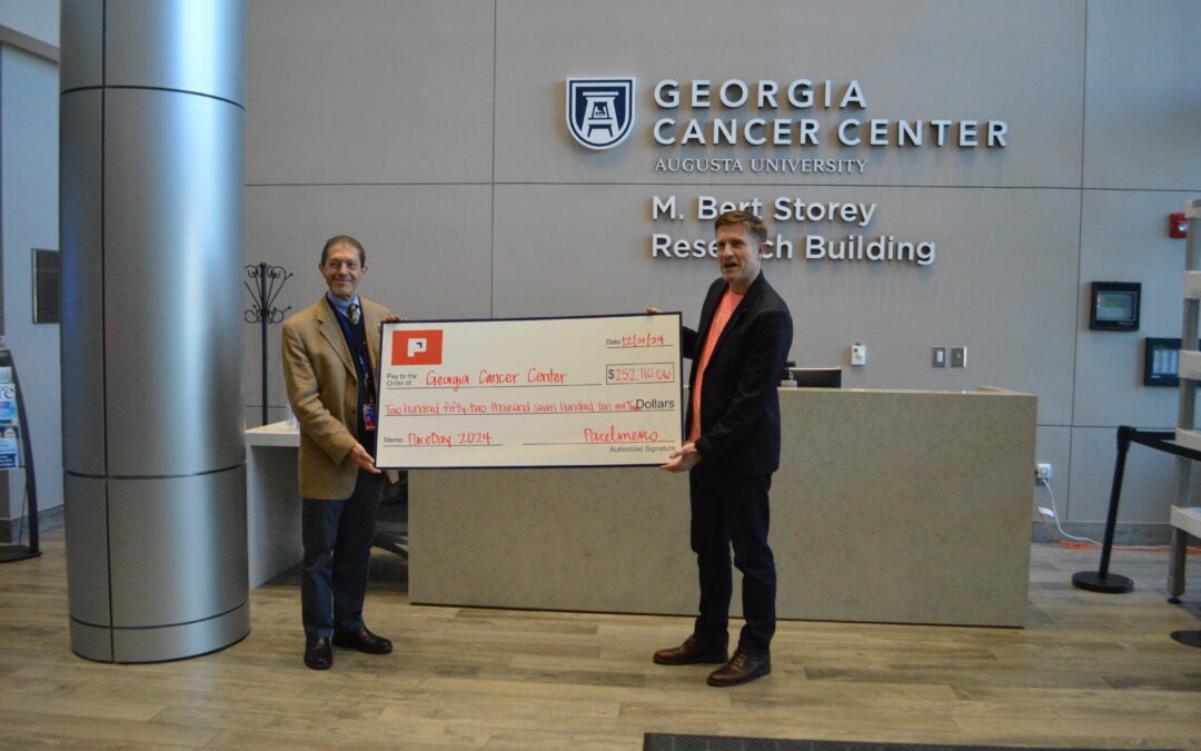 Paceline presents over $250K to Georgia Cancer Center