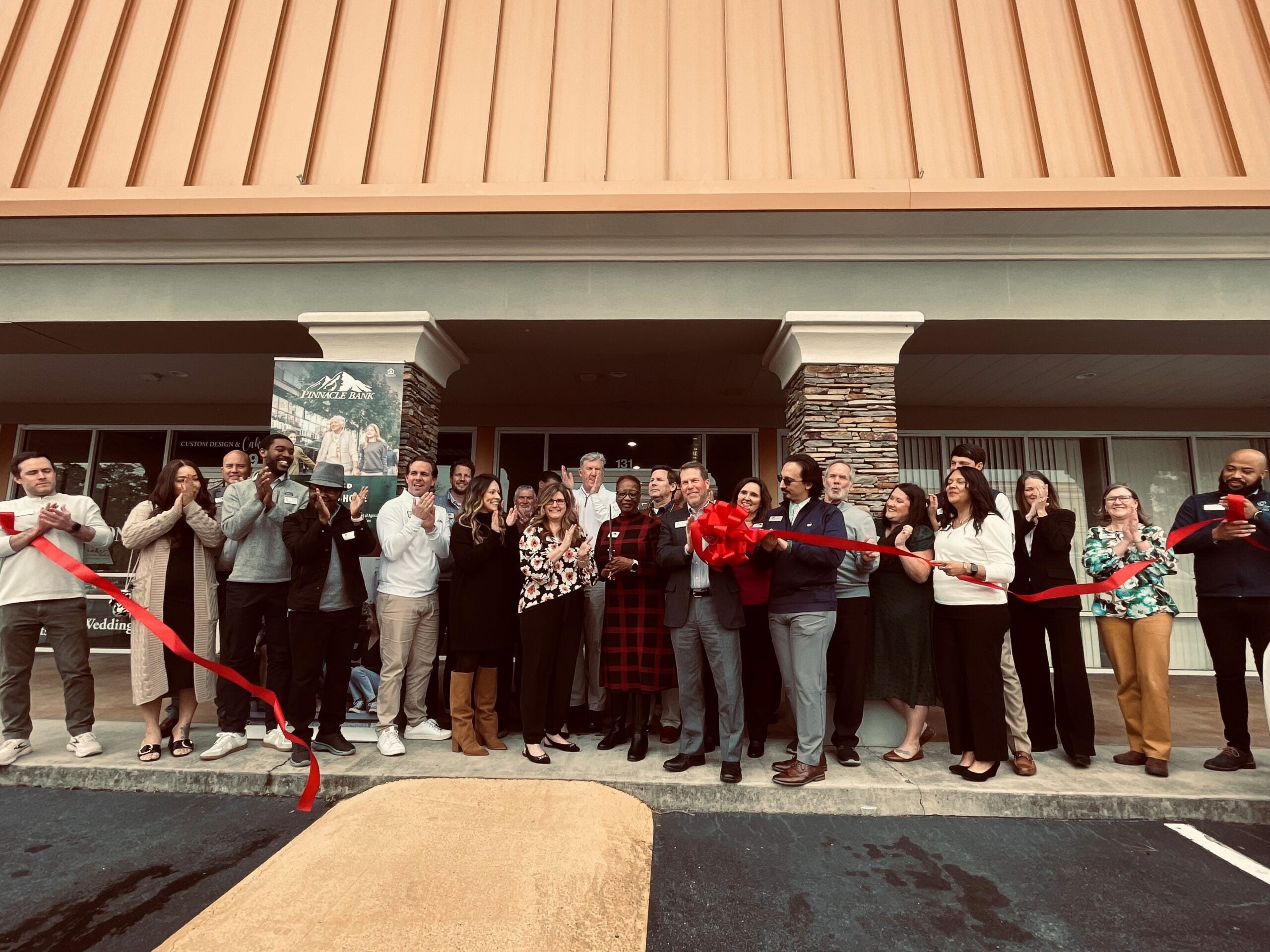 Pinnacle Bank celebrated the opening of its mortgage lending office on the Augusta side of Furys Ferry Road last week. Staff photo by Skyler Andrews