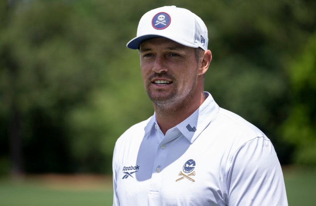 Bryson DeChambeau of the United States walks on the Tournament Practice Area during the third round of the Masters at Augusta National Golf Club, Saturday, April 12, 2025.