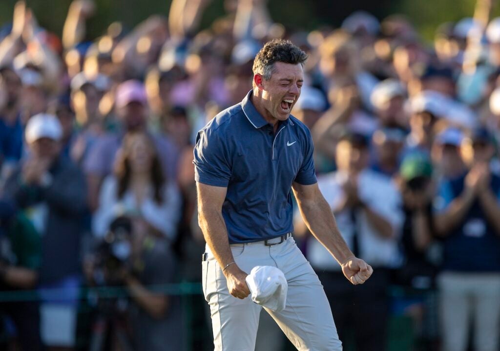 Masters champion Rory McIlroy of Northern Ireland celebrates on the No. 18 green after a sudden death playoff against Justin Rose of England to win the Masters at Augusta National Golf Club, Sunday, April 13, 2025.