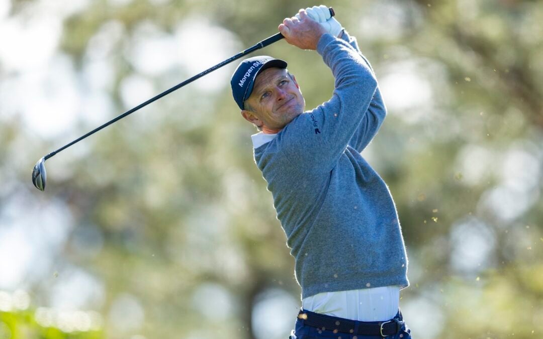 Justin Rose of England plays a stroke from the No. 4 tee during the second round of the Masters at Augusta National Golf Club, Friday, April 11, 2025.