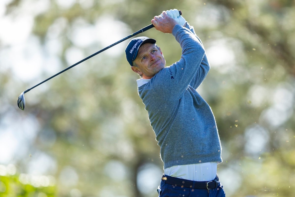 Justin Rose of England plays a stroke from the No. 4 tee during the second round of the Masters at Augusta National Golf Club, Friday, April 11, 2025.
