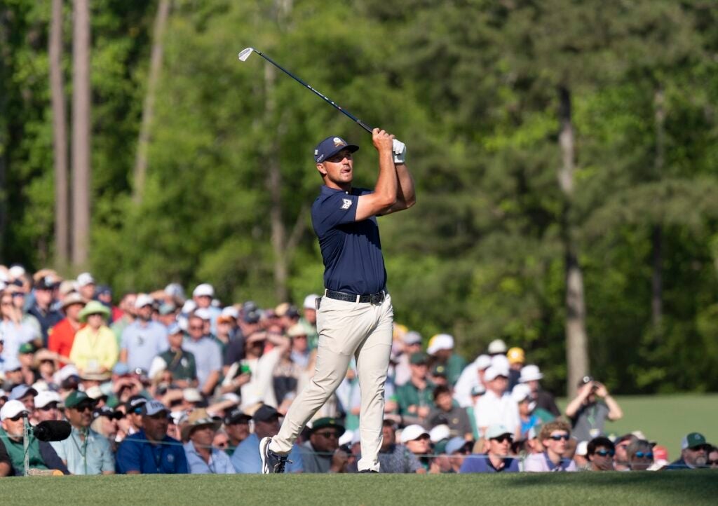 Bryson DeChambeau of the United States plays a stroke from the No. 12 tee during the final round of the Masters at Augusta National Golf Club, Sunday, April 13, 2025.