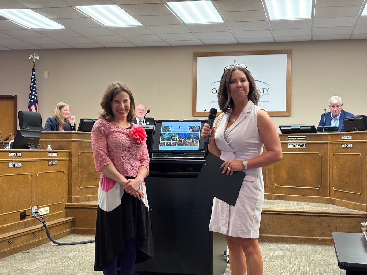 Columbia County District 4 Commissioner presented a proclamation to Marlena Bergeron declaring April as Native Plant Month. Staff photo by Stephanie Hill