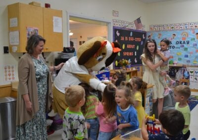 Students at Greenbrier Preschool had a blast interacting with Cali, the Department of Early Care and Learning mascot. Staff photo by Stephanie Hill