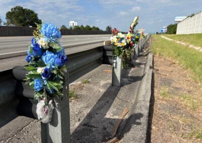 There is a memorial with flowers and crosses on I-20 westbound near exit 194 to honor fallen Deputy Brandon Sikes. Photo by Stephanie Hill