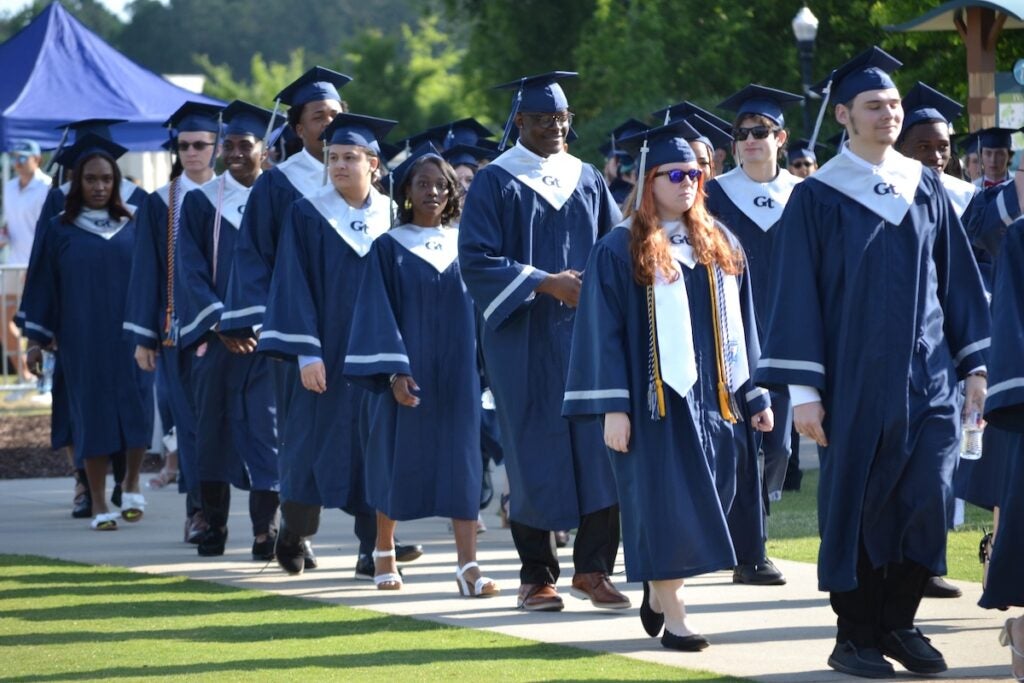 Grovetown High School graduates walk into the graduation ceremony on Friday, May 23. Staff photo by Stephanie Hill