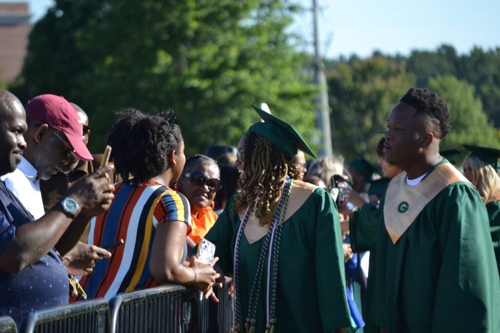 Graduates talked with their friends and family before the Greenbrier High School graduation. Staff photo by Stephanie Hill