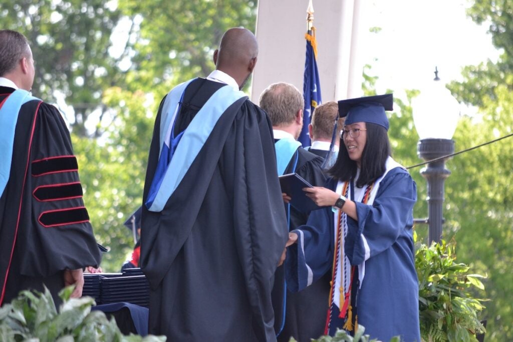 Grovetown High School valedictorian Carrie YinQian Lim received her diploma at the commencement ceremony. Staff photo by Stephanie Hill