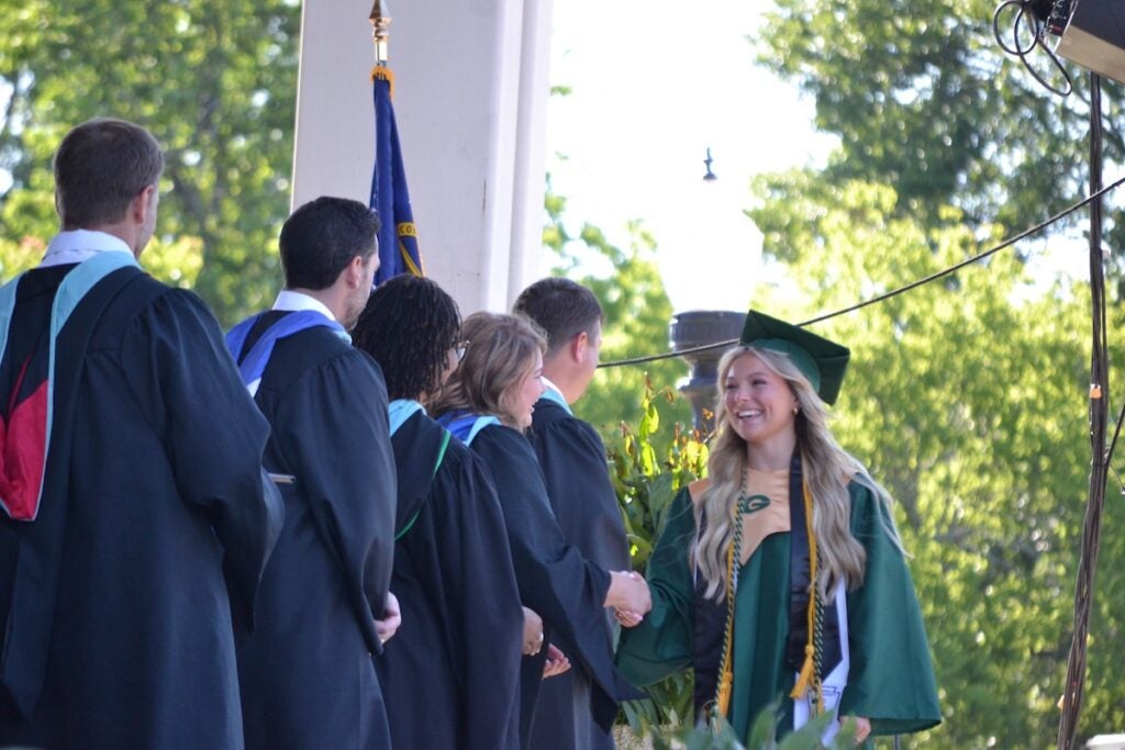 Greenbrier High School graduates shook hands and smiled while making their way across the stage to receive their diplomas. Staff photo by Stephanie Hill