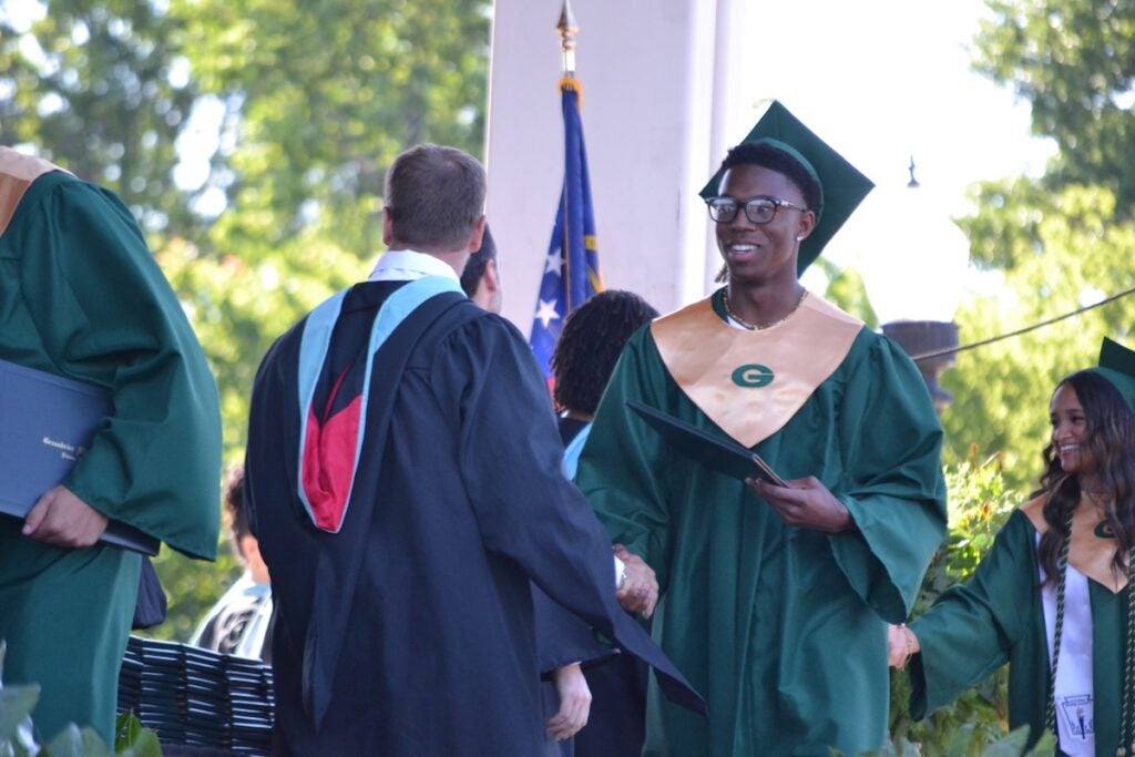 Greenbrier High School graduates shook hands and smiled while making their way across the stage to receive their diplomas. Staff photo by Stephanie Hill