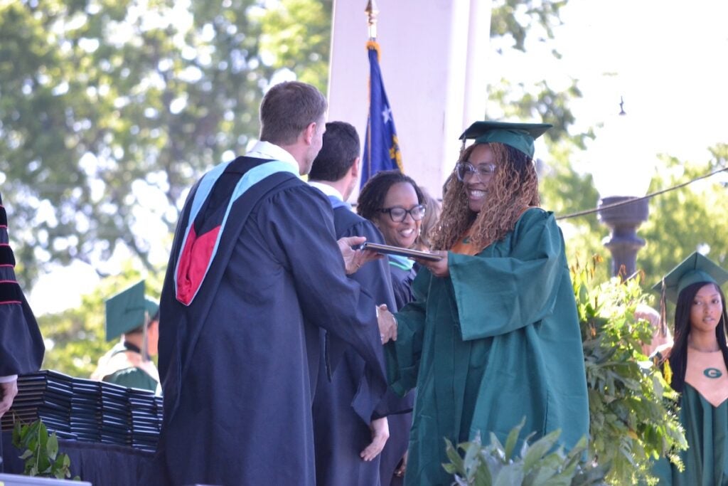 Greenbrier High School graduates shook hands and smiled while making their way across the stage to receive their diplomas. Staff photo by Stephanie Hill