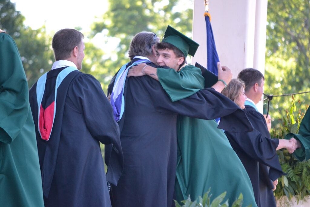 Greenbrier High School graduates shook hands and smiled while making their way across the stage to receive their diplomas. Staff photo by Stephanie Hill