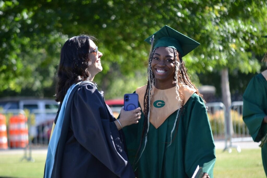Greenbrier High School graduates shook hands and smiled while making their way across the stage to receive their diplomas. Staff photo by Stephanie Hill