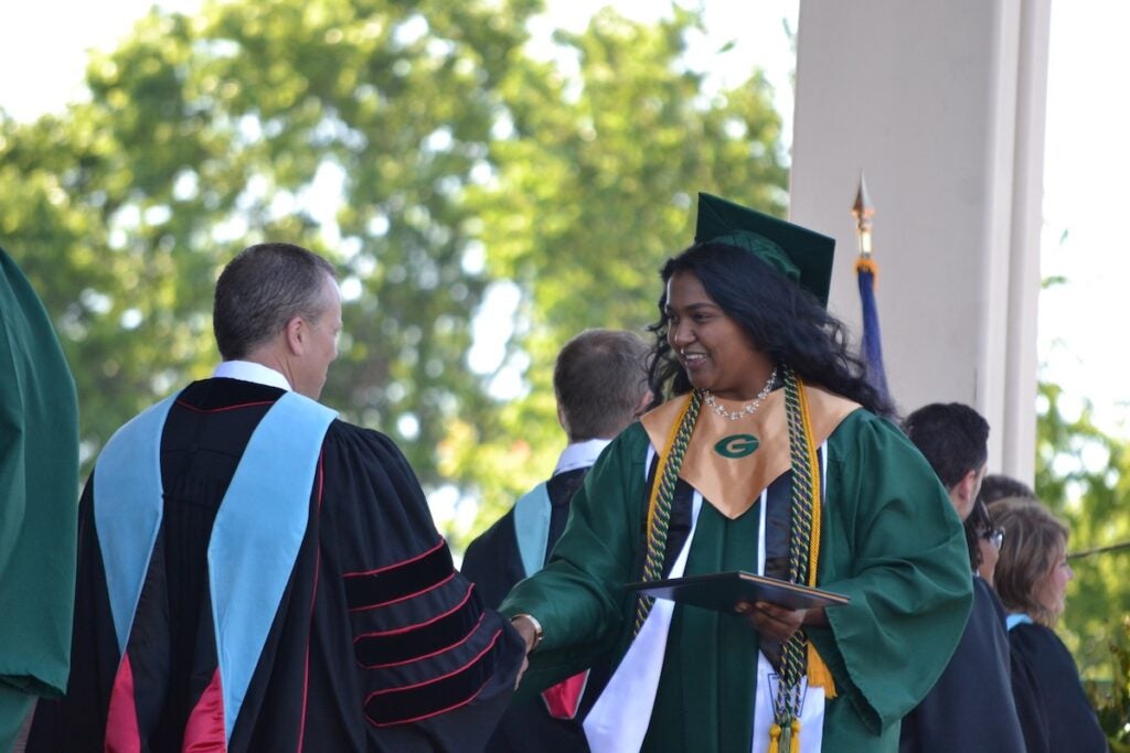 Greenbrier High School graduates shook hands and smiled while making their way across the stage to receive their diplomas. Staff photo by Stephanie Hill
