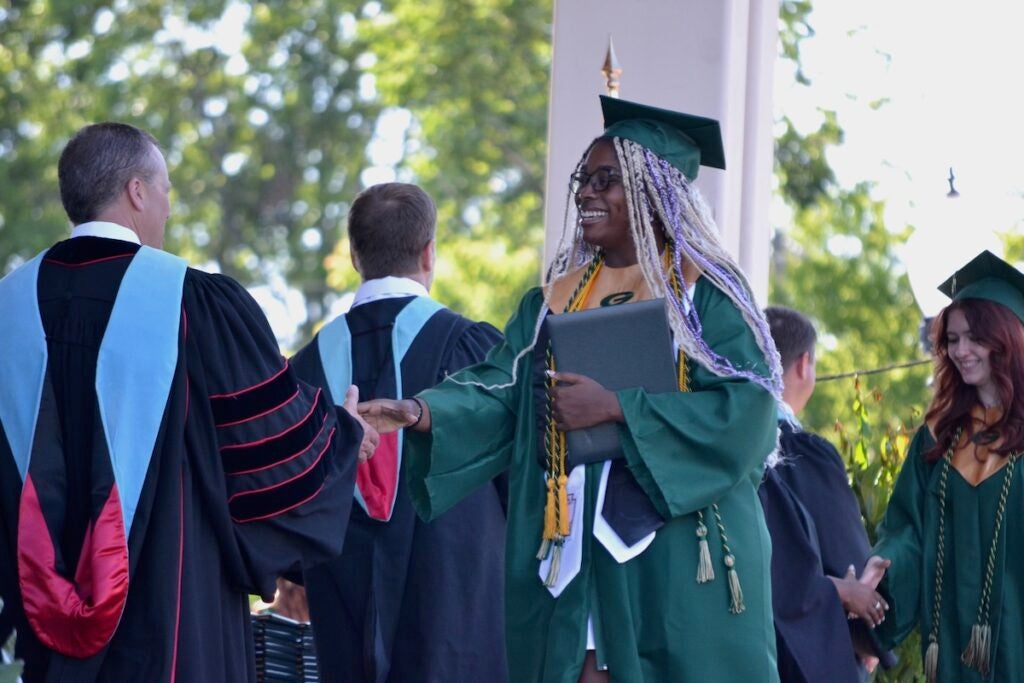 Greenbrier High School graduates shook hands and smiled while making their way across the stage to receive their diplomas. Staff photo by Stephanie Hill